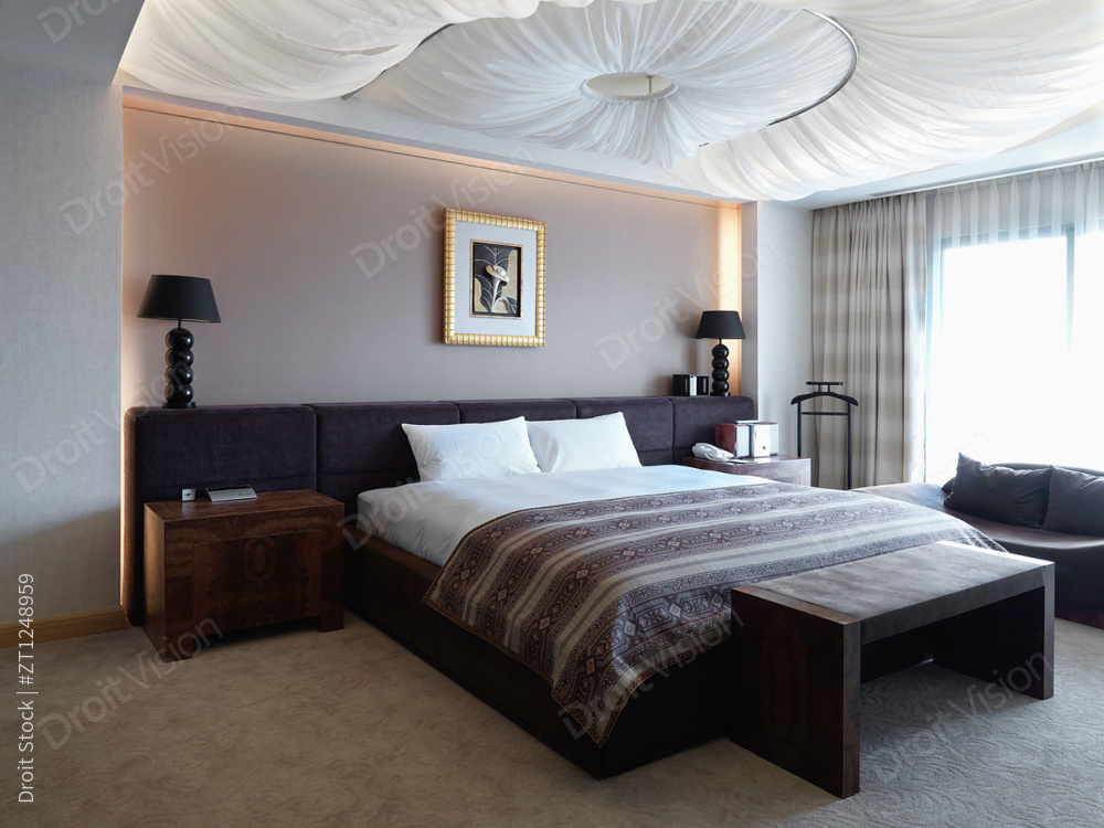 Hotel bedroom interior with covered ceiling图片