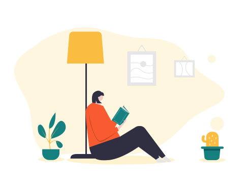 女生靠在台灯下看书