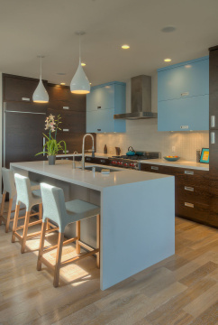 Blue breakfast bar and cabinets in contemporary house; San Francisco; California; USA