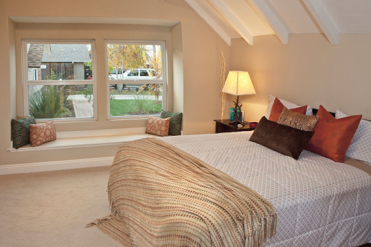 Contemporary bedroom in two story house; California; United States of America