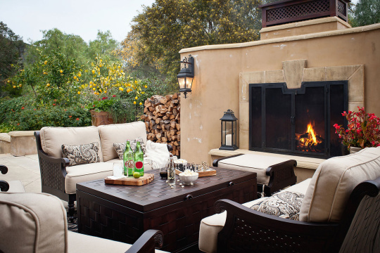 Outdoor sitting area with plants in background at patio; Rancho Sante Fe; USA