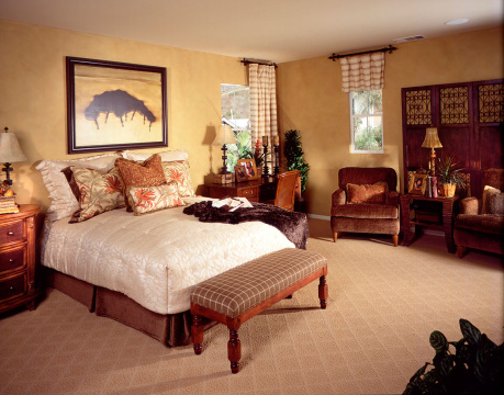 Interior of bedroom with end stool