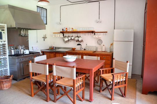 Dining table and kitchen counter in average home