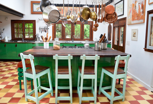 Utensils hanging over breakfast bar in house