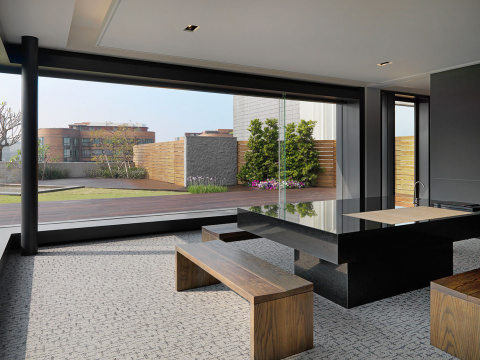 Kitchen island and seating furniture in office kitchen