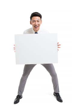 年轻商务男士展示白板