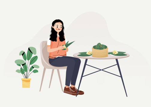 端午节包粽子的女孩