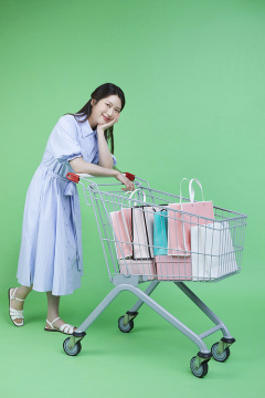 绿色消费者_购物车和购物袋礼品盒女性图片图像 